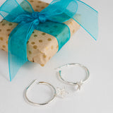 Open Hoop Earrings with Star Charms