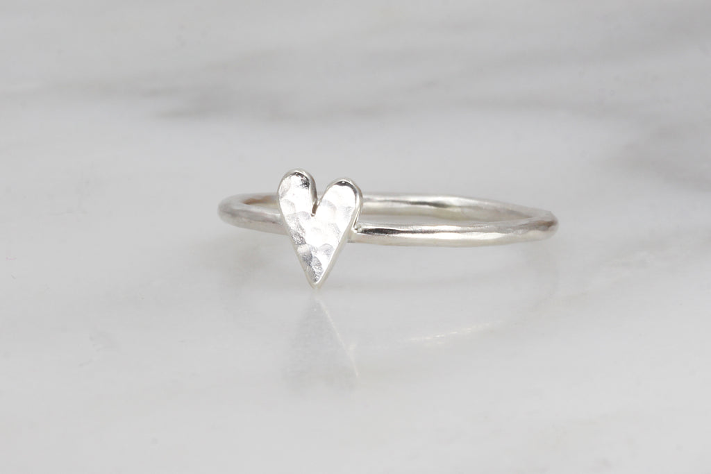 8 mm sterling silver elongated heart on a lightly hammered ring.