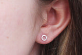 tiny pebble hoop stud earring hammered sterling silver on model close up